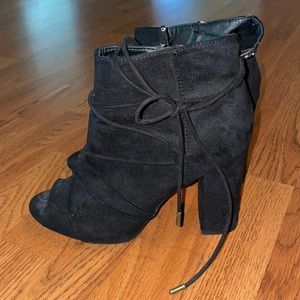 Women’s black booties with tie detail